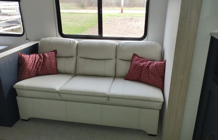 couch with custom made pillows