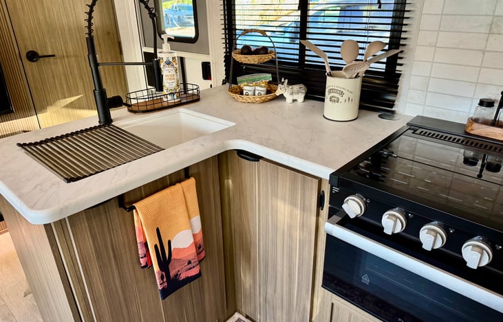 Fully stocked modern kitchen.