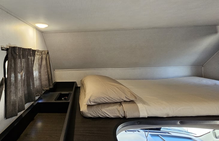 Over the driver top bunk storage display