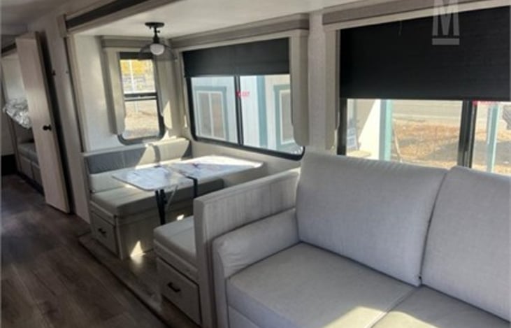 Dinning table that converts into a bed