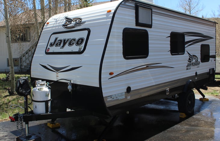 We like the front window to keep an eye on the stuff in the back of our truck at night