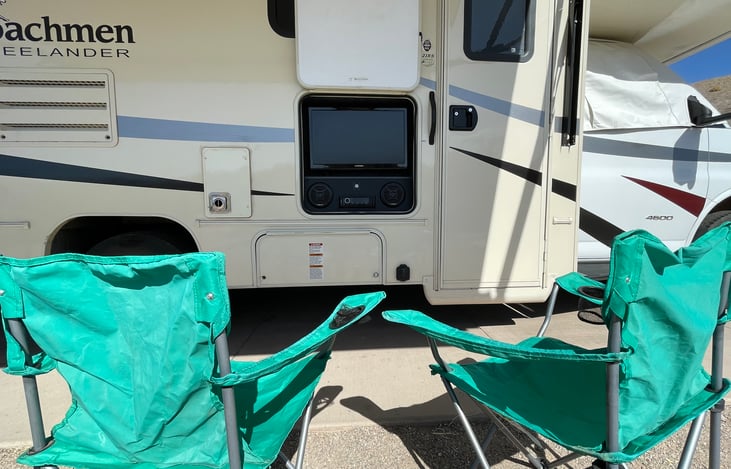 Outdoor TV/ Entertainment center with HDMI ports. DVDs included.