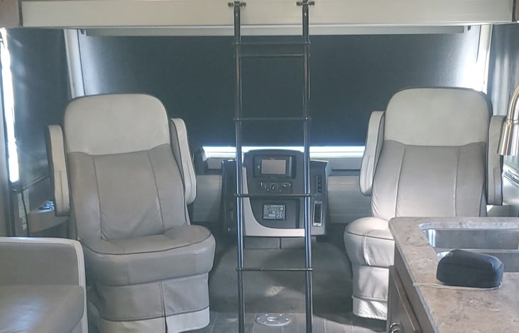 Drop down bunk over cab