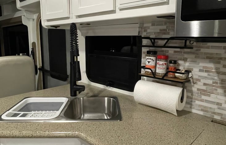 paper towel holder and shelf for seasonings etc.