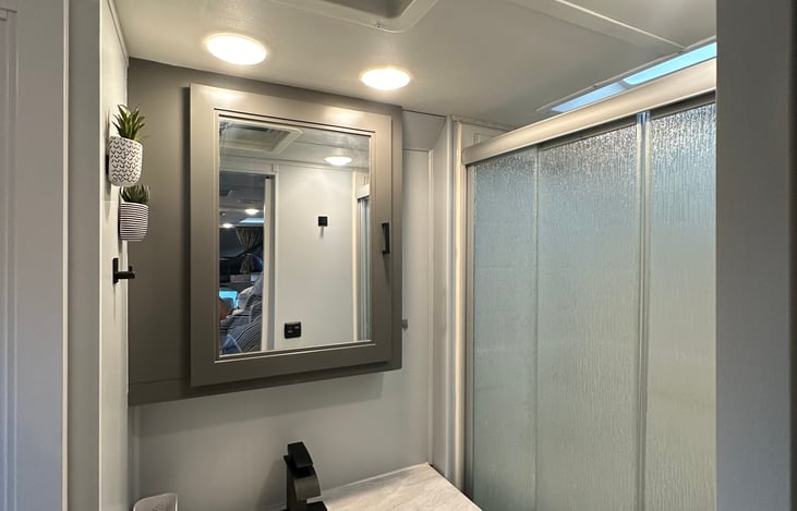 Bathroom with full medicine cabinet