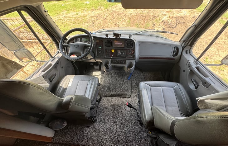 Comfortable and spacious captain chairs with back-up and side cameras.