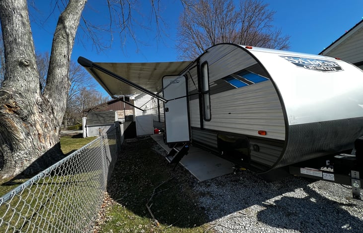 Side with awning out.