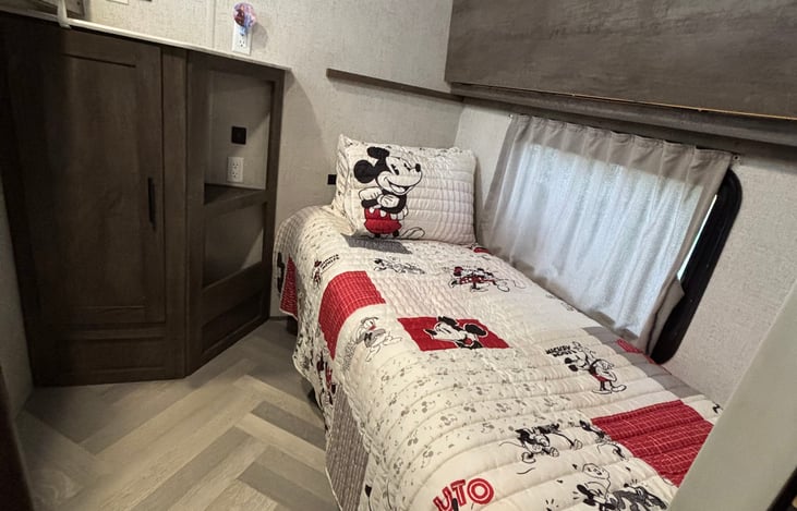 Back dinette converted to short twin bed.