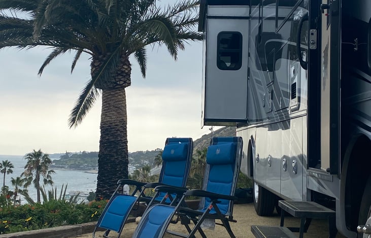 Reclining camp chairs included