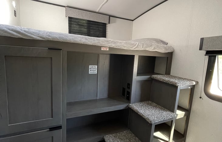 Storage and steps to bunk