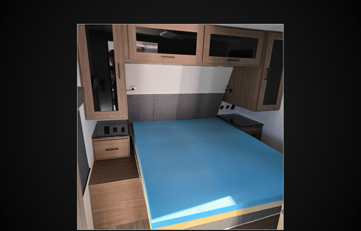 👑 Master Bedroom Comfort
Retreat to your private sanctuary! The master bedroom comes standard with a large, comfortable bed and features many cleverly placed storage locations, ensuring you have plen