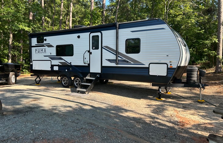 30 FT, lighted awning and outdoor speakers