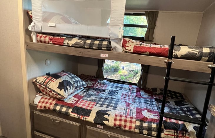 Bunkbeds with a rollout protection up top!