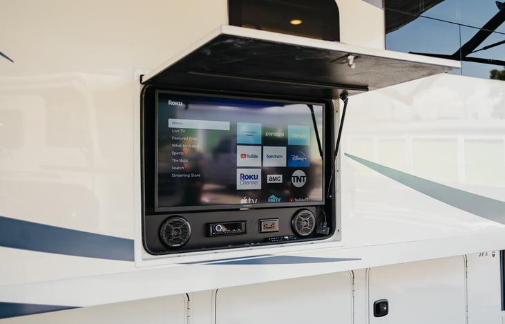 TV equipped with Roku to stream Netflix, Disney, Amazon, Hulu and more.  Full DVD player, FM stereo and USB port to play your fav tunes.