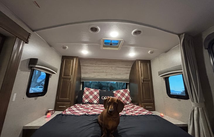 The roomy queen size bed will make all of you feel right at home.