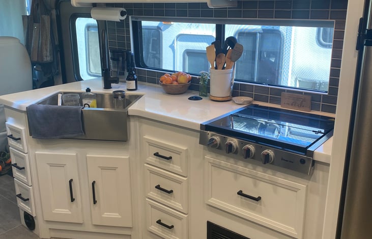 Kitchen (no oven but convection oven option on microwave)