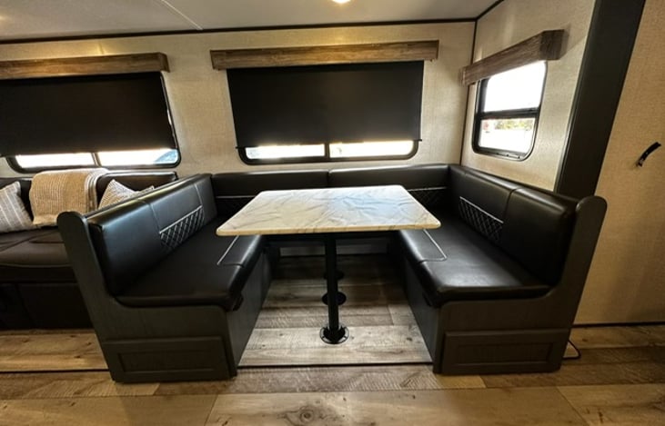Plenty of dining space to eat and also folds down into a bed area.