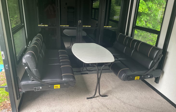 Bottom bunk folds up into bench seats to sit down for a meal