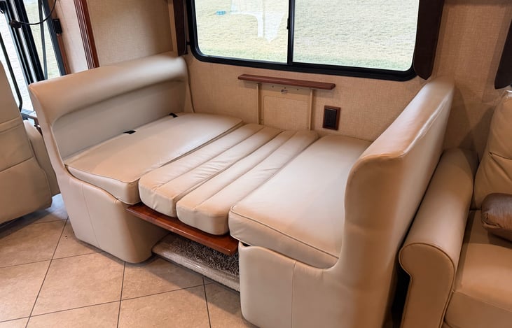 Front Dinette in the front set up for sleeping.