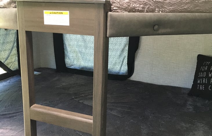 The private bunkroom features double over double bunks with 2 USB ports and storage for each bunk. Large windows with screens let in plenty of fresh air.