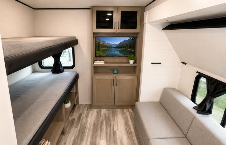 Couch folds out to a bed for more room for kids! There is also another bunk above couch area that can be pulled down!