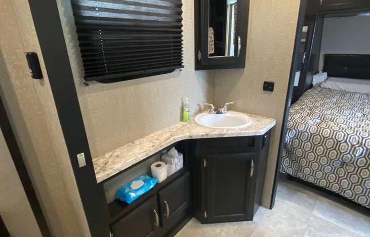 Vanity and mirror for getting ready and quick clean ups