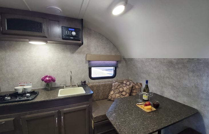 There is plenty of storage under the queen bed, under seat and under table.