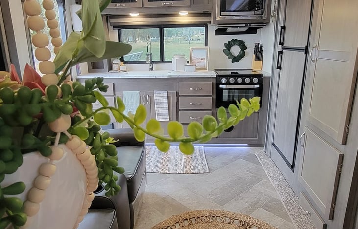 There is a table that can be attached to the couches. This is stored under the bed.
