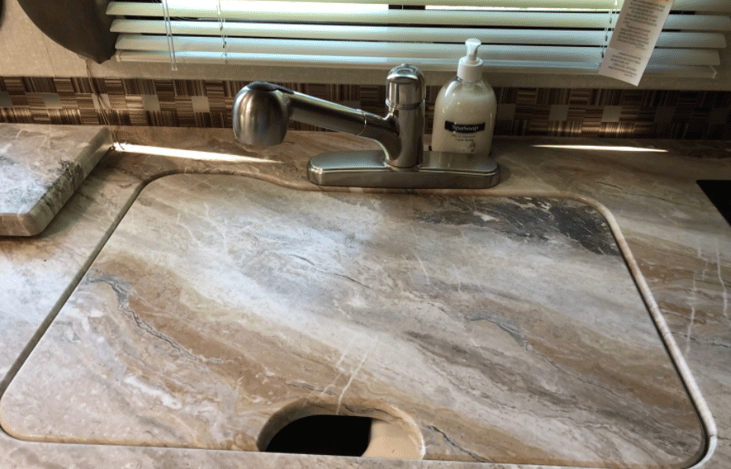 Kitchen sink with cover on