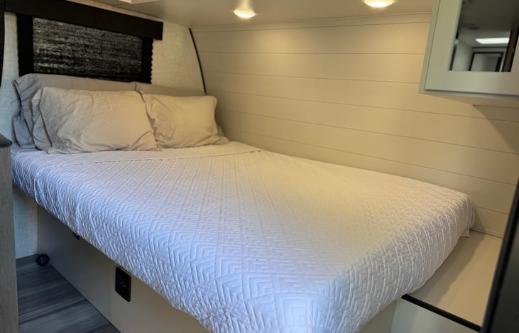 Master Queen bed with a curtain for privacy