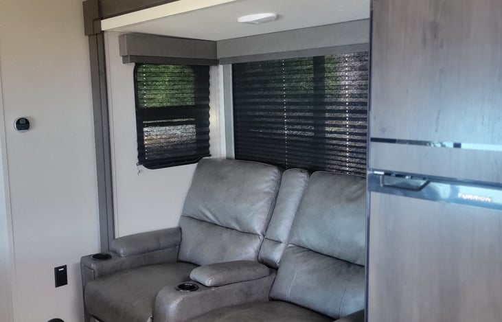 Theater recliners, so comfortable to watch TV in or sleep all night.