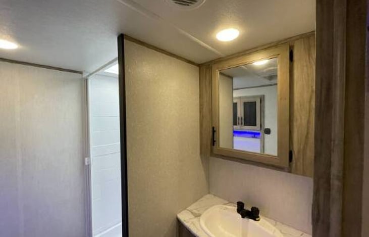 Incredibly spacious bathroom with large shower, sink, toilet and plenty of storage. Towels, TP, etc included.