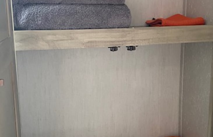 Linen closet in bathroom