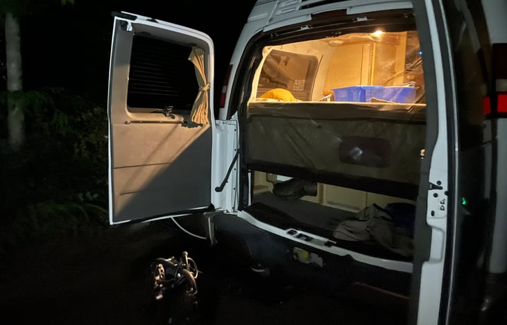 Rear of van showing screens in place and rear storage / trunk area