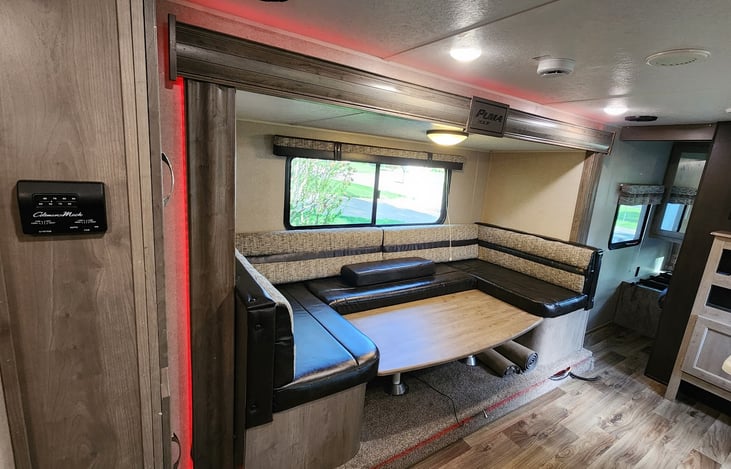 Slideout table lowered (cushions can be rearranged to sleep up to 2 adults)