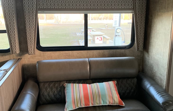 Jackknife sofa has 2 seatbelts & converts to small bed (for children)