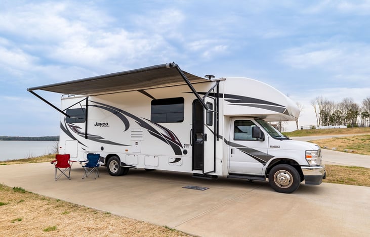 Camping chairs, grill, kitchen supplies, linens, towels, and board games included!