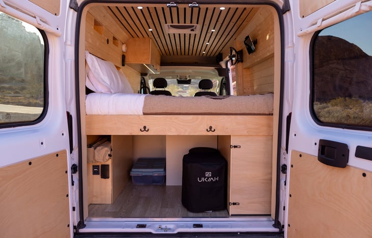 Loads of storage through the back doors. Shown with optional fire pit add-on.