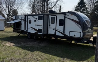 Family Fun by Missaukee Lake. 33’ travel trailer