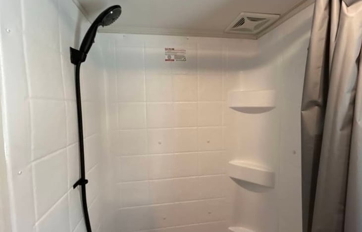 small tub in the back bathroom