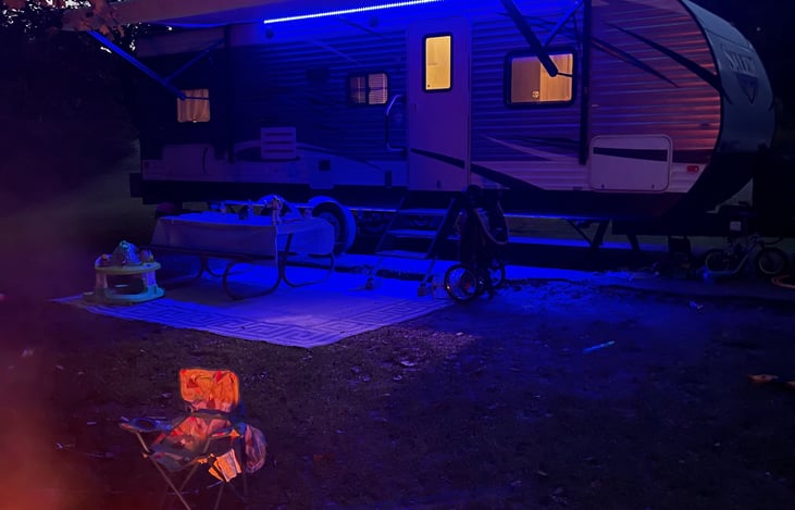 Led lights under awning and under the camper. Awning lights are color and brightness adjustable.