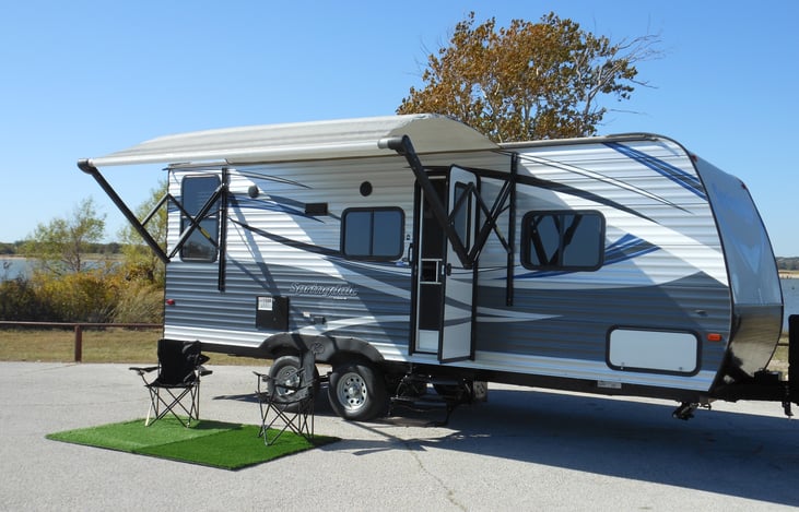 Awning  out on a beautiful day at the lake.