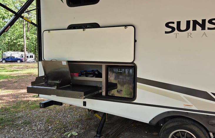 Outdoor grill with mini fridge
