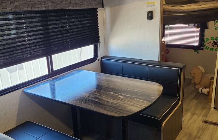 Dinette makes into an extra bed.