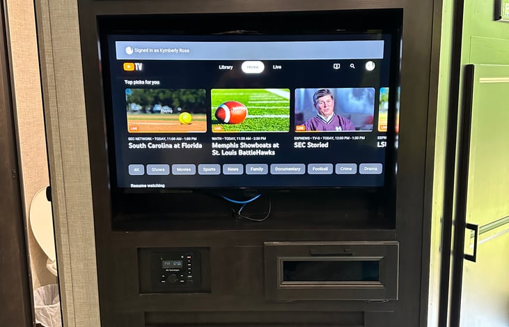 smart TV in the living area above the fireplace