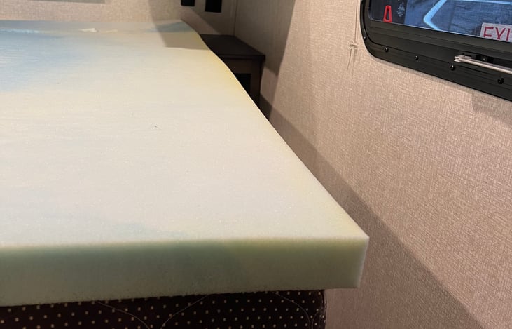 Super comfy mattress topper in the master bedroom