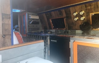 Stealthy Work Van Holds Suprising Comfort Inside