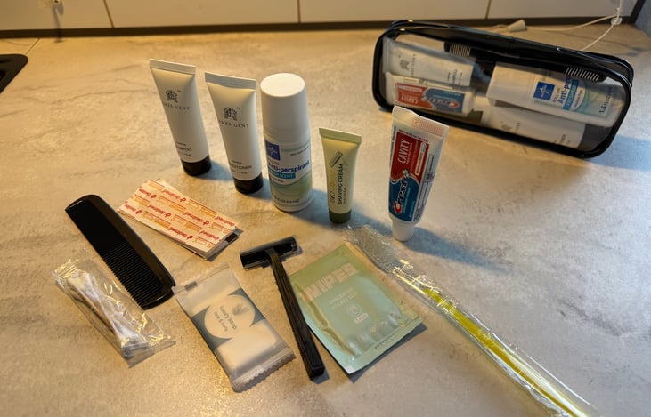 toiletry kit included. 1 per adult