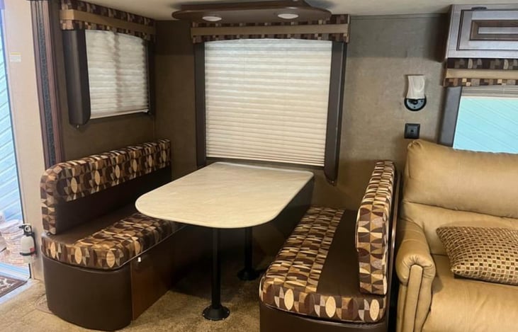 Very spacious dinette for family meals or playing games in the evening