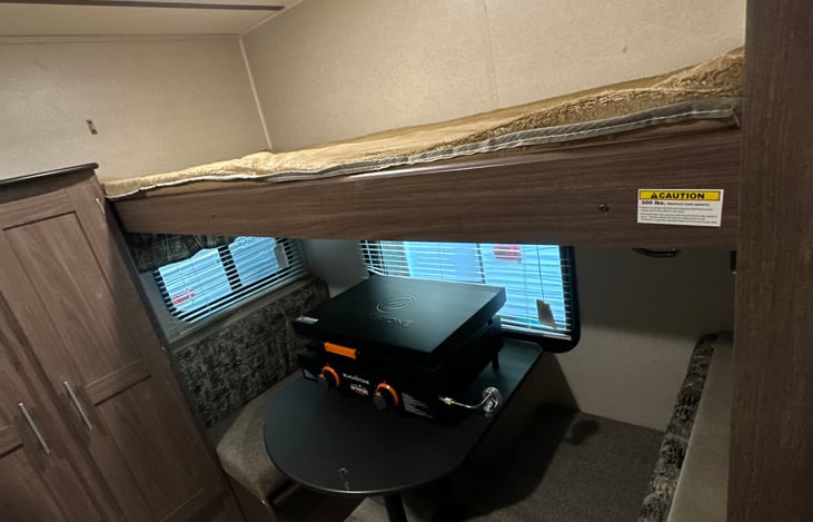 Bunk open, dinette opened and can be made into a 4th twin bed.